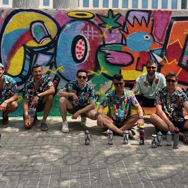 group of friends at a graffiti bachelor party in barcelona