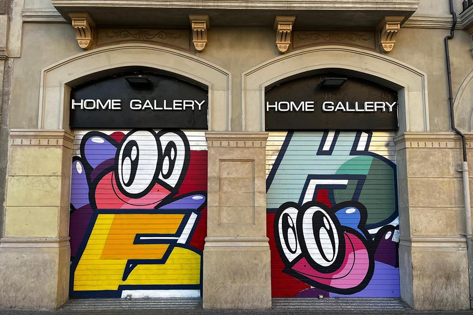 street art decorates the metal shutters