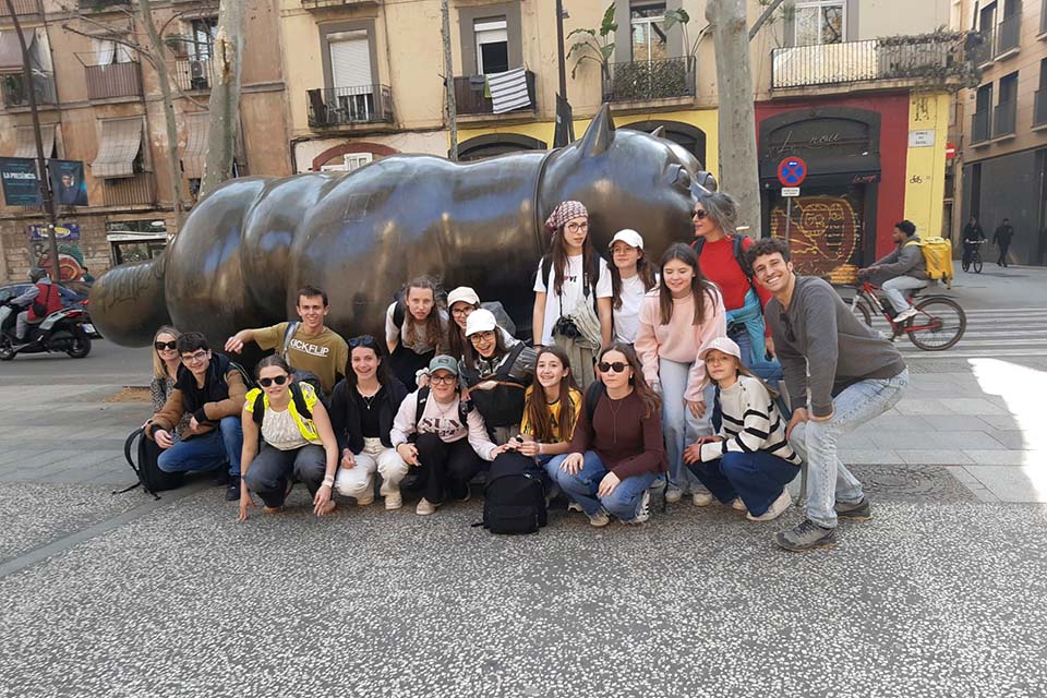 student travel in Barcelona, at Santiago Botero's statue