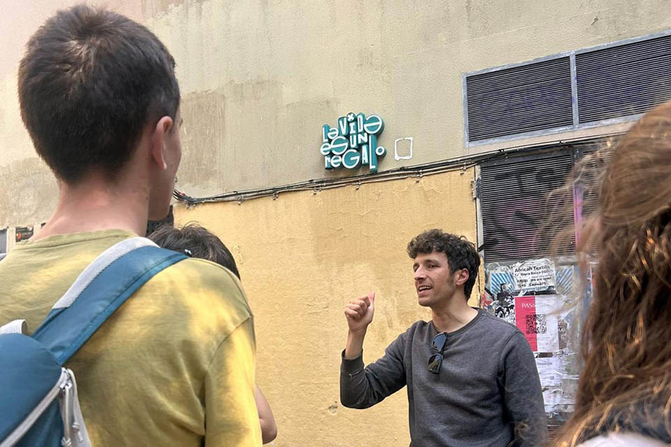 discussion about street art on the educational school trip in barcelona